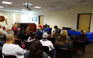 CVMT representatives Tiger Paulk, Mildred Burley and Michele Burley sharing Miwok culture and history at a Native American Heritage Month event.