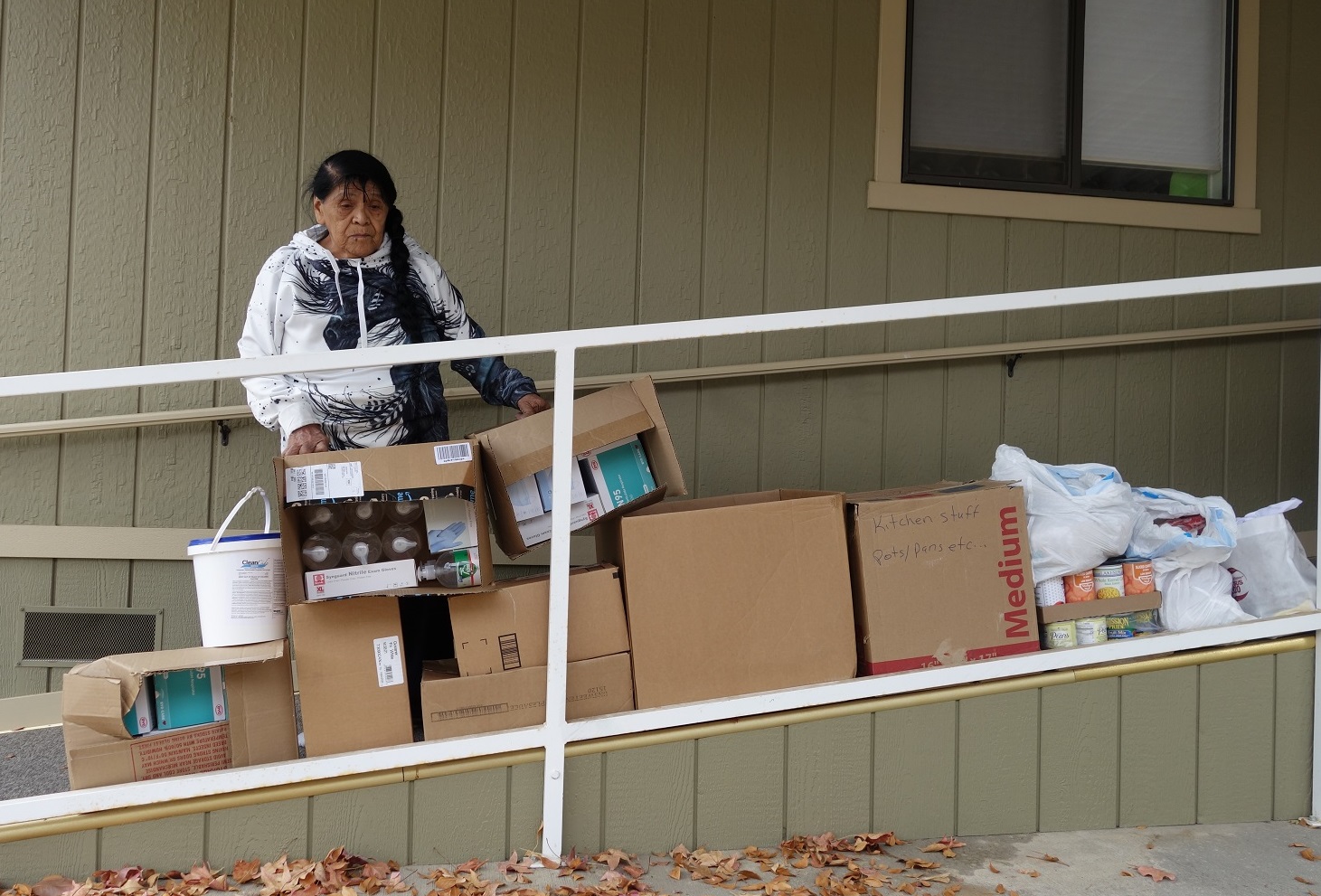 California Valley Miwok Tribal elder Mildred Burley with good supplies from the Food For Tribal Families program.