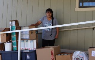 California Valley Miwok Tribe's elder Mildred Burley with good supplies