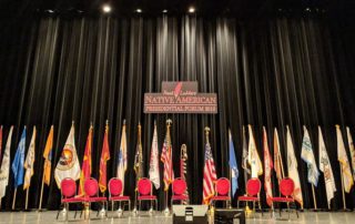 Native American flags at the Frank LaMere Native American Presidential Forum 2019