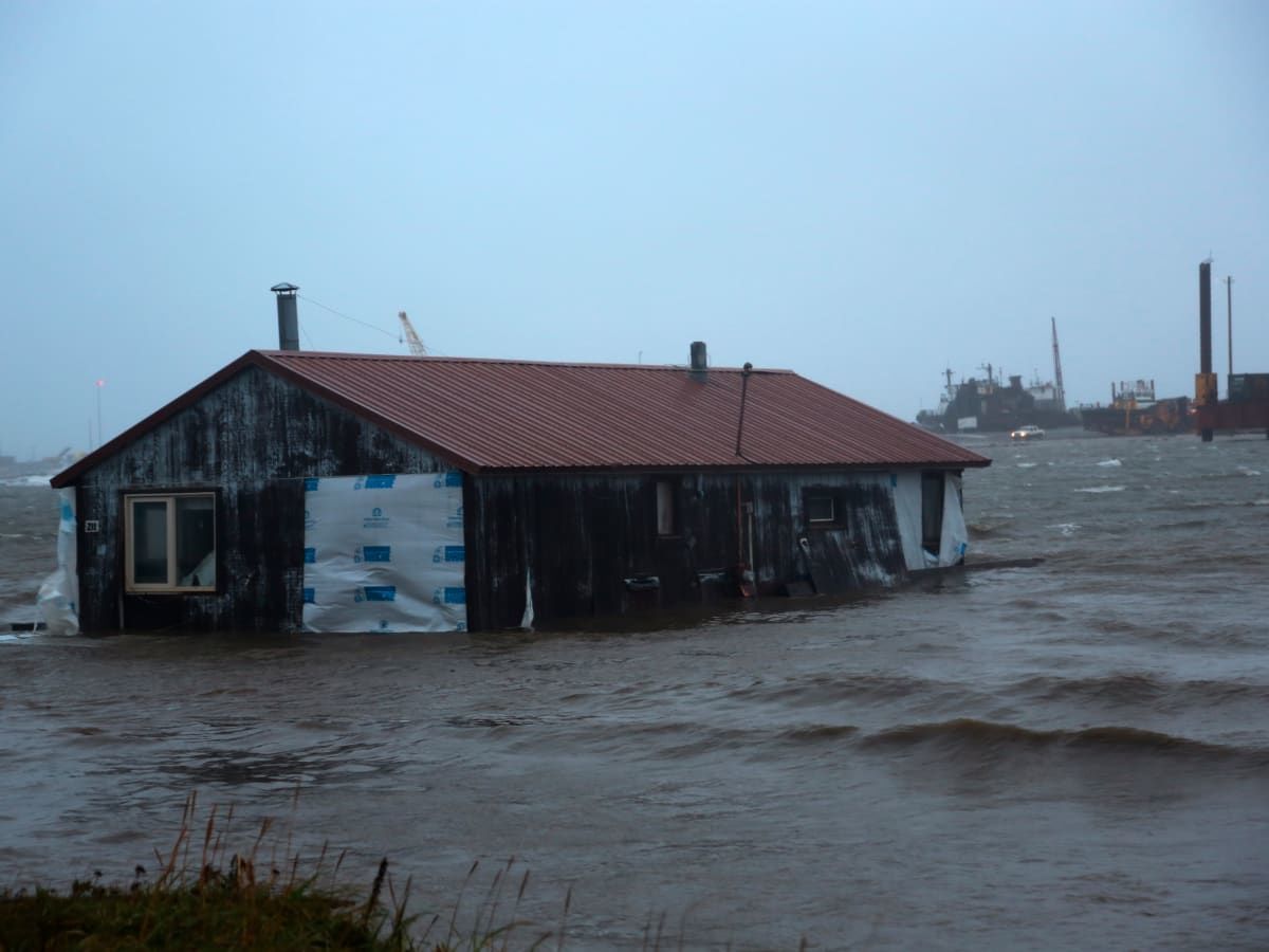 Floating home in Snake River near Nome, Alaska, during the Typhoon Merbok in September 2022.