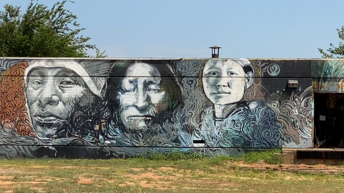 Murals on the rear side of the abandoned Concho Indian Boarding School in El Reno, Oklahoma.