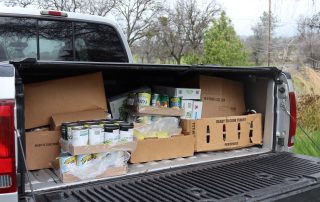 California Valley Miwok Tribe's food distribution in F250 trunk.