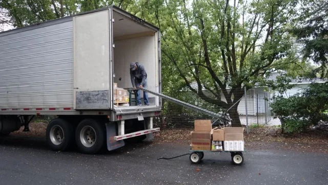 Specialist Ronald Buckman breaking down equipment after the last distribution.