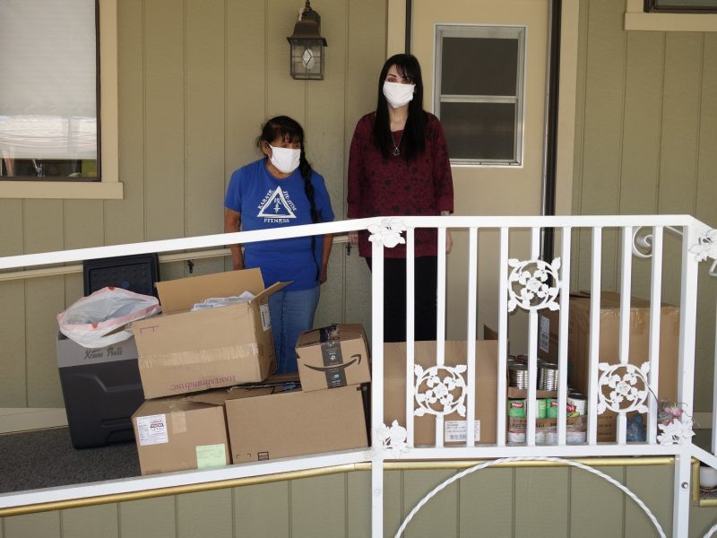 Program Director Mildred Burley with Tribal Secretary / Treasurer Rashel Reznor stand with this months delivery, which along with an abundance of food included COVID-19 health supplies delivered to the tribe by FEMA.