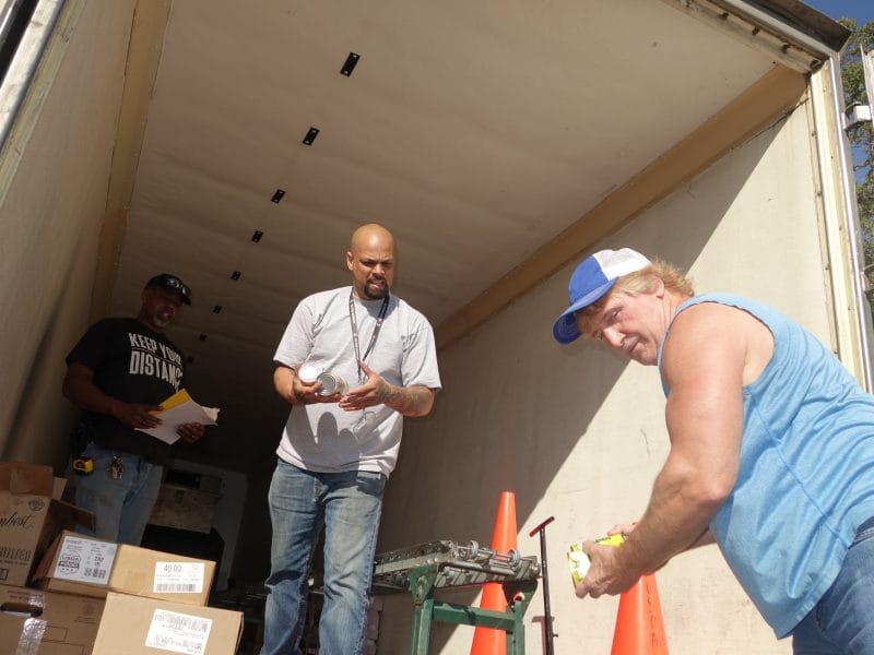 For the most part Specialist in training, "Nos" was loading conveyor, but personally brought out the last few items that were needed to finish final distribution as Specialist Ronald Buckman prepared documents regarding distributions.