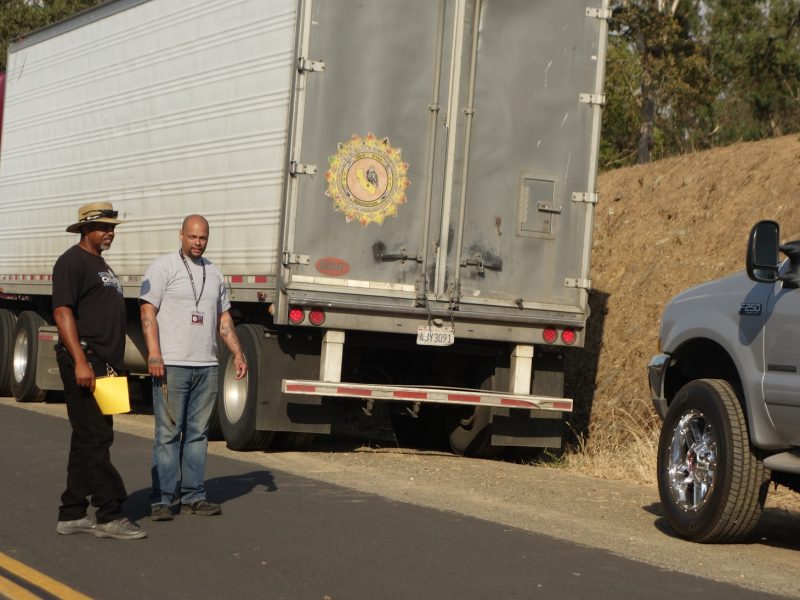The end of another successful distribution. Ronald Buckman, "holding signing documents" and Naz having a brief discussion about concluded distribution just before heading out.