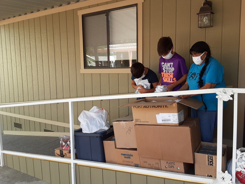 It was already time to distribute a portion of the Covid-19 supplies as one tribal citizen just out of picture arrived for their allotment. Other than sanitizers and literature there were enough masks alone for tribal citizen families to make it through the month. We would like to thank D.J. and Dante for assisting Mildred as this proved to be a very busy day. August 2020 Food For Tribal Families Distribution