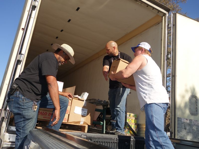 Specialist Naz turns away and hands supplies at arms length as a way that we have developed to better mitigate safety. We have also all been recently tested.