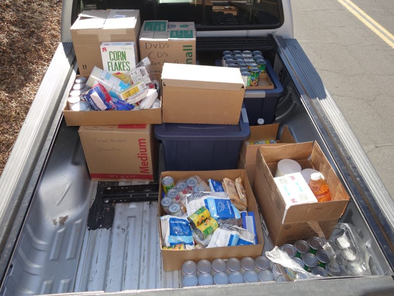 With extra families that have now signed up but need special tribal delivery to their locations, half way through distribution truck was already filling up.
