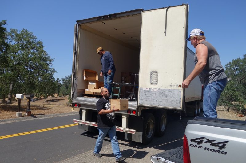 As Tule River Food specialist, ( Naz ) brings the last of the specific distributions that the tribe deliver's to those in need, specialist Ronald Buckman makes a last check before shutting doors. Tiger Paulk helps unloading good supplies with Tule River food distribution staff