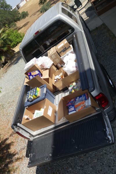 As with all deliverable distributions the tribe must put all frozen items into its freezers until the next days deliveries. California Valley Miwok Tribe's good supplies in back of a truck.