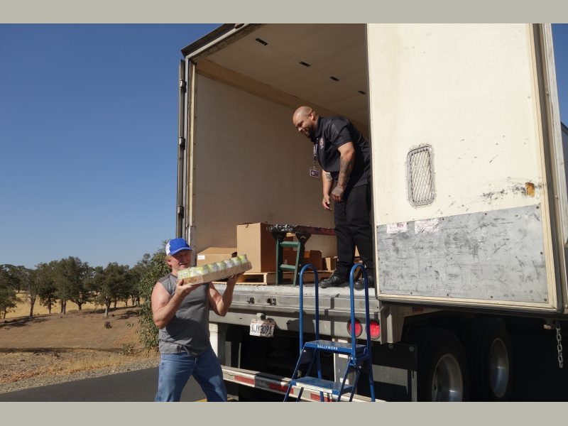 California Valley Miwok Tribe's staff unloading good supplies.