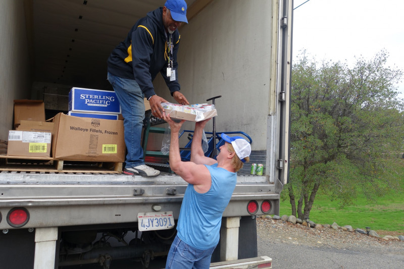 Again with the jokes, Specialist and professional comedian, "Ronald Buckman" kept the humor flowing and spirits light throughout the deliveries. California Valley Miwok Tribe's staff delivering good supplies.