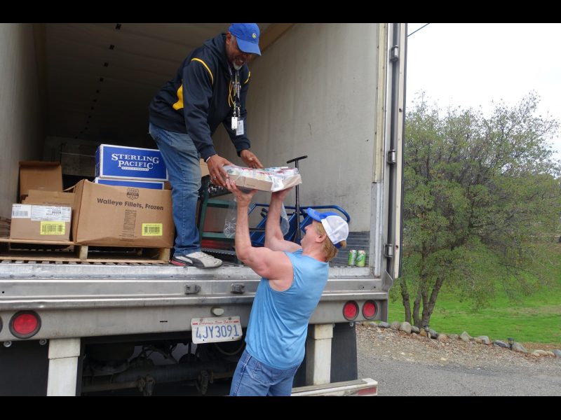 Again with the jokes, Specialist and professional comedian, "Ronald Buckman" kept the humor flowing and spirits light throughout the deliveries. California Valley Miwok Tribe's staff delivering good supplies.