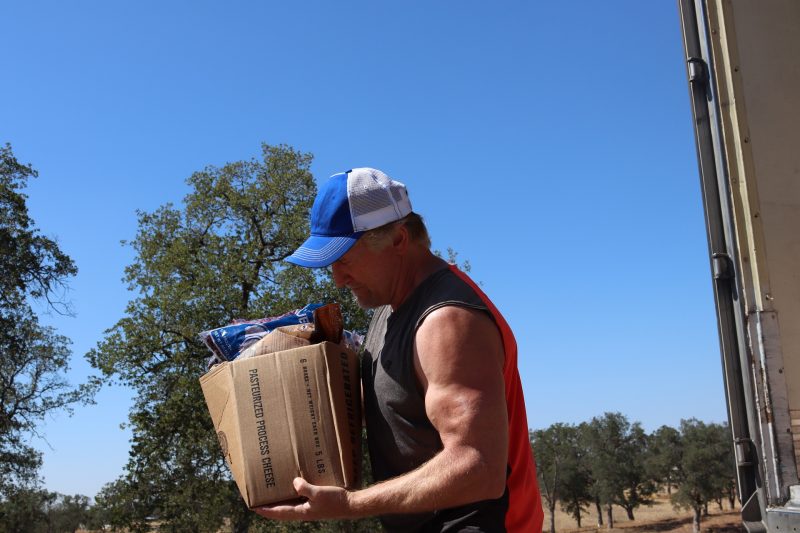 Just one of the many boxes being loaded for later deliveries in the coming days. California Valley Miwok Tribe staff member Tiger Paulk carrying good supplies.