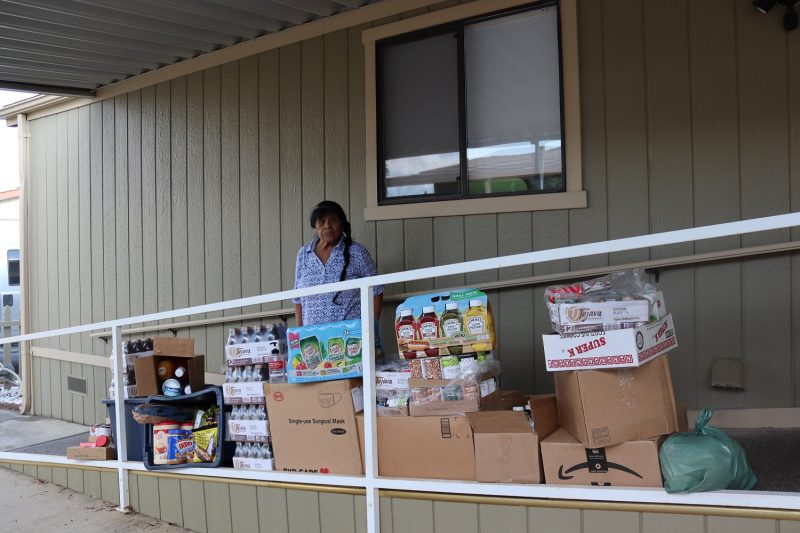 FFTF Program Director, Mildred Burley stands with this month's delivery. California Valley Miwok Tribe Elder with good supplies