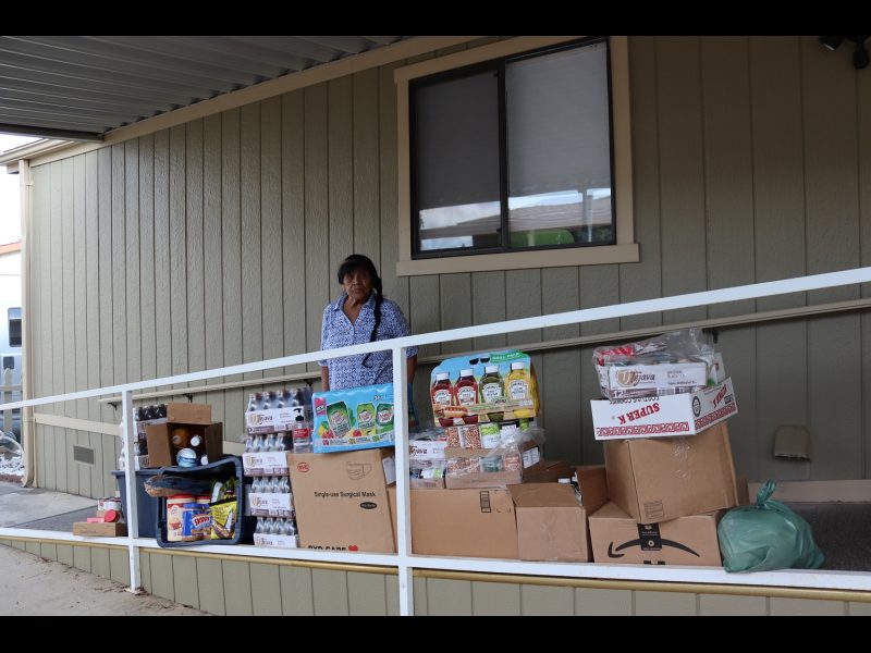 FFTF Program Director, Mildred Burley stands with this month's delivery. California Valley Miwok Tribe Elder with good supplies