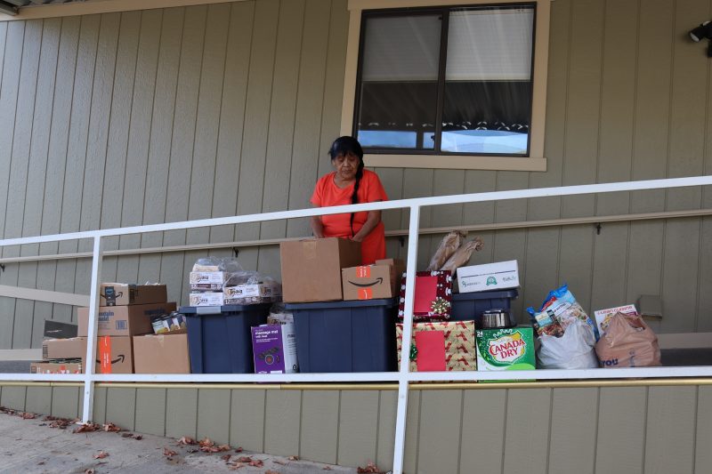 Program Director of Food For Tribal Families Program Mildred Burley. Tribal elder Mildred Burley with CVMT goods.
