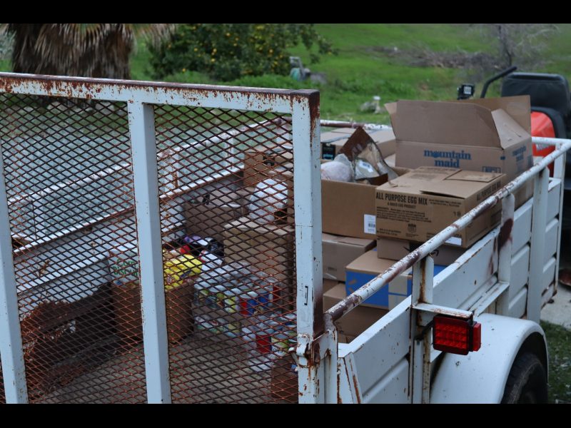 Picture displays foods that will additionally be personally delivered or held for pick up. Tribal goods in trailer.
