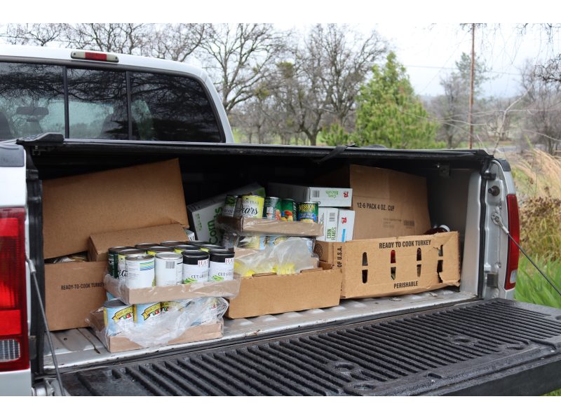At the end of this day it was as much about keeping all food not picked up
dry as it was receiving. It was especially difficult sliding food forward as it completely filled an F250 bed. California Valley Miwok Tribe's food distribution in F250 trunk.
