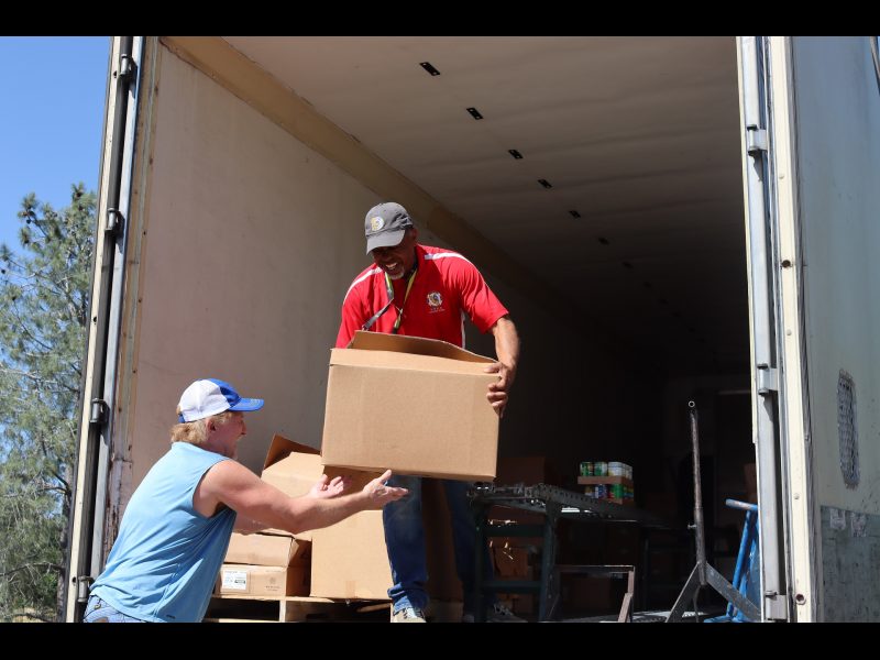 Almost the end of the distribution and spirits still rein high, what happens when everyone actually has good intentions and work together to the benefit of the Native American community. Ronald Buckman helping California Valley Miwok tribal staff Tiger Paulk to deliver goods for the tribe.