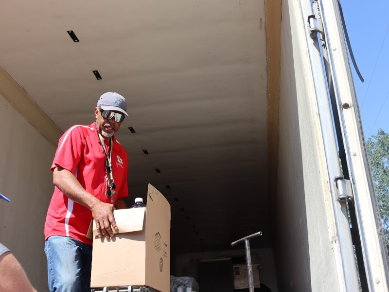 Here the beginning of another distribution as Specialist Ronald Buckman
waits on tribal staff. Tule River Food Specialist Ronald Buckman