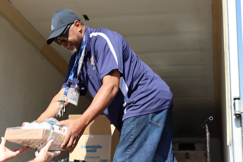 The start of another great distribution as Ronald Buckman works with tribal staff. Ronald buckman handling the food distribution in September 2023.