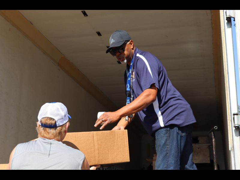The end of one recipients distribution as Ronald Buckman readies to add more
to the conveyor for the next one. Ronald buckman handling the food distribution in September 2023.