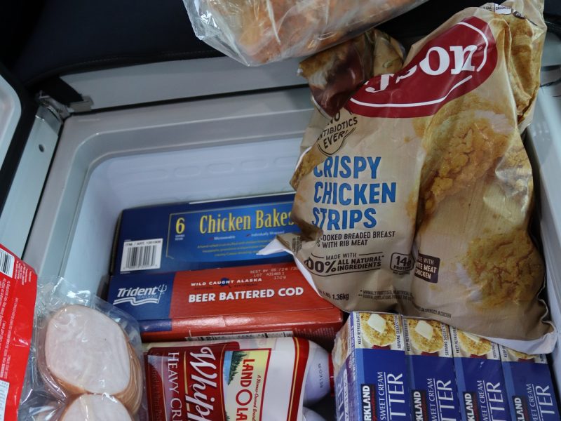 Various meats, condiments and meal items.