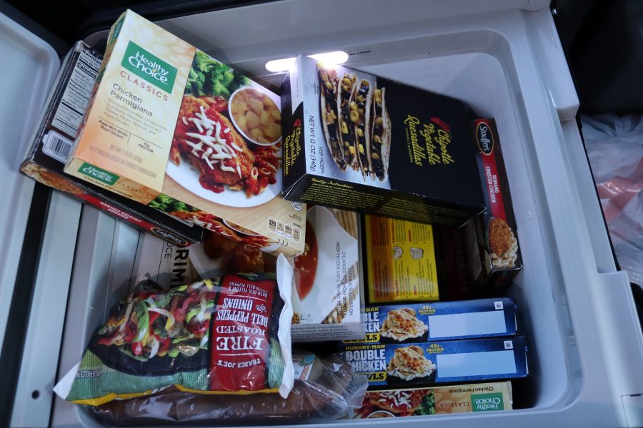 Just some items visible in this very stuffed freezer. Pre-cooked meals for tribal families.