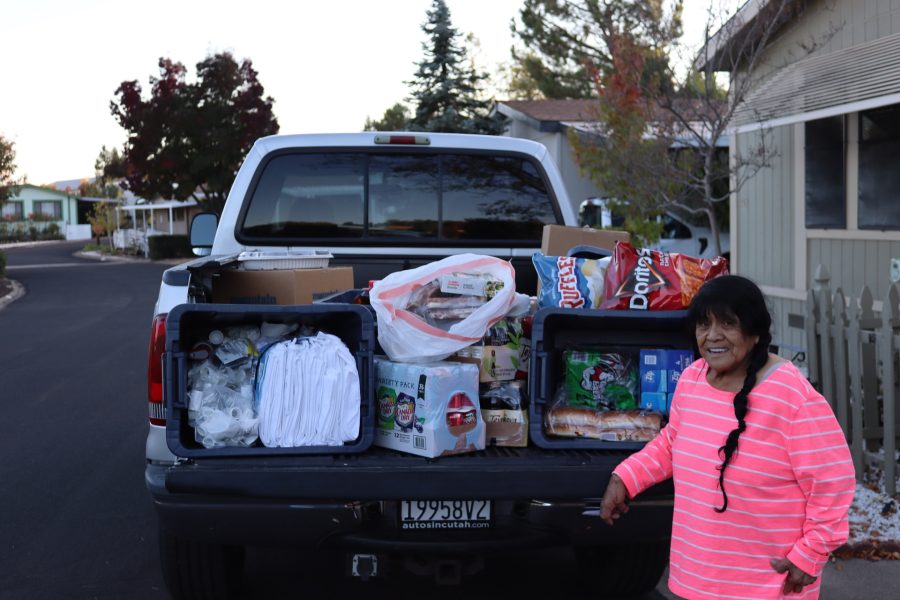 With all the malfeasance wrought against her tribal people's by local BIA, on days like this they still can not wipe the smile from our beloved tribal elder's face. Miwok tribal elder Mildred Burley, in front of foods for tribal families.