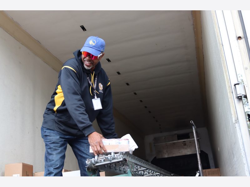 Tule River Specialist Ronald Buckman unloading the last item of the last distribution of the day. Ronald Buckman unloading goods for the California Valley Miwok Tribe.