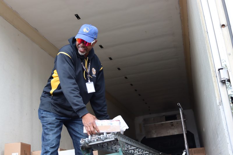 Tule River Specialist Ronald Buckman unloading the last item of the last distribution of the day. Ronald Buckman unloading goods for the California Valley Miwok Tribe.