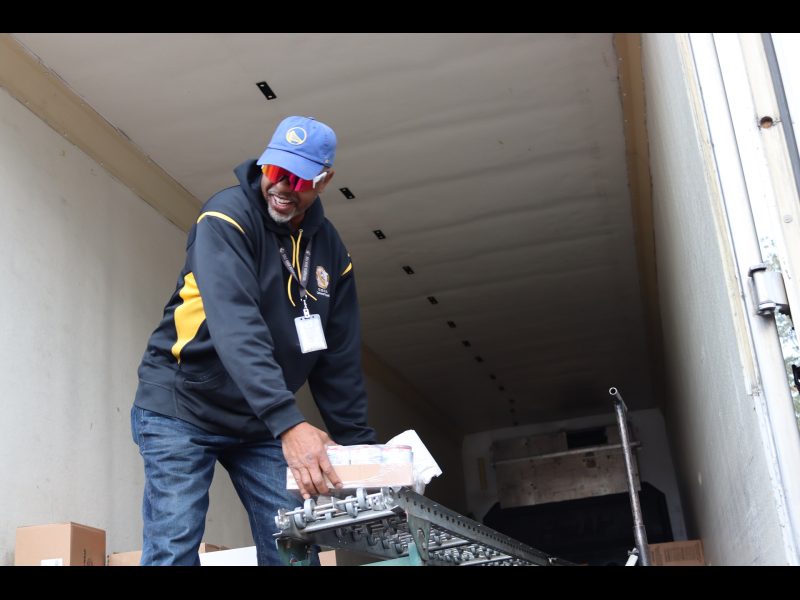 Tule River Specialist Ronald Buckman unloading the last item of the last distribution of the day. Ronald Buckman unloading goods for the California Valley Miwok Tribe.
