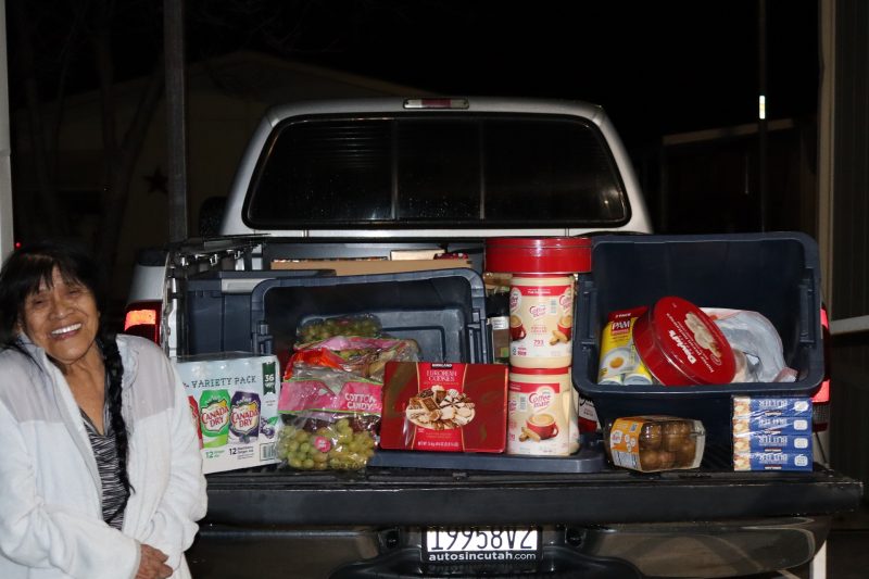 It was a great occasion as much was addressed in this delivery and the joy expressed by our very youthful looking Program Director, Mildred Burley (86) years young, highlighted this event making it all the more worth the effort. Miwok tribal elder Mildred Burley is standing in front of a truck filled with goods for tribal members.