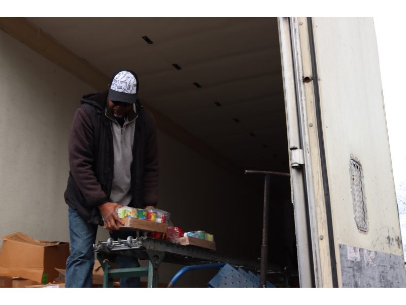 Final distribution of the day with just a few items left on conveyor. Ronald Buckman finishing the 2024 January distribution for the California Valley Miwok Tribe.