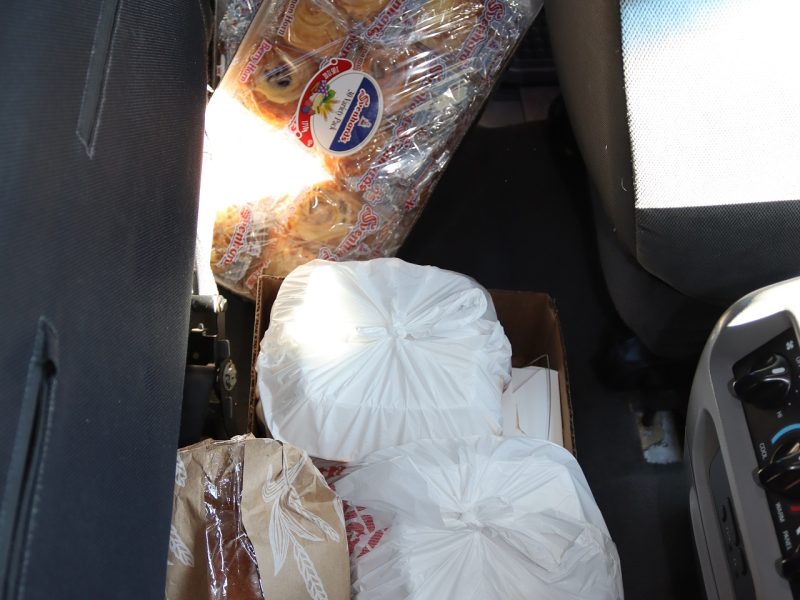 Chinese take out, bread and massive pastry boxes. Diverse foods to be delivered during the February 2024 Food For Tribal Families Program.