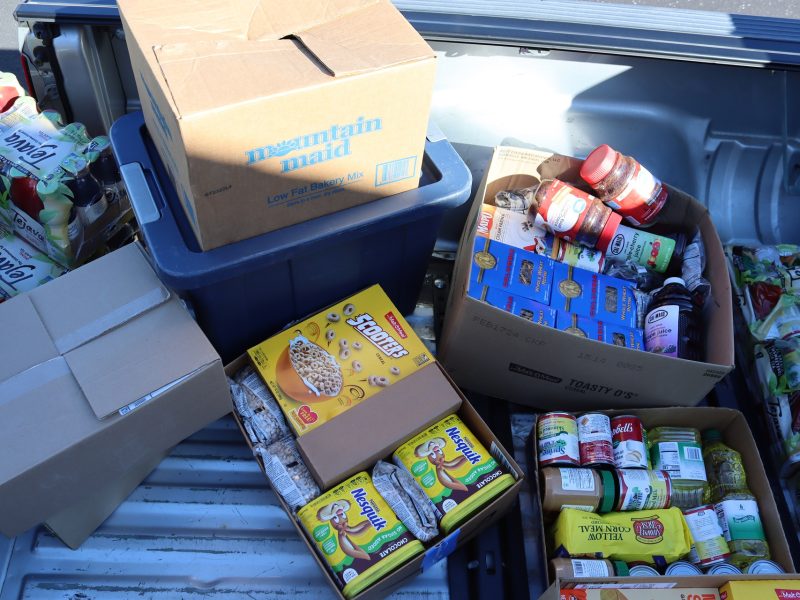 Coffee, chocolate, juices, cereals, beans, noodles, boxes full of baked goods and tub full of breads. Diverse foods to be delivered during the February 2024 Food For Tribal Families Program.