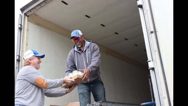 Last of the last distribution. It is always fun and there is always a good feeling prevalent knowing you are helping families in their time of need. Tiger Paulk and Ronald Buckman helping each other unload goods for the February 2024 USDA Food Distribution.