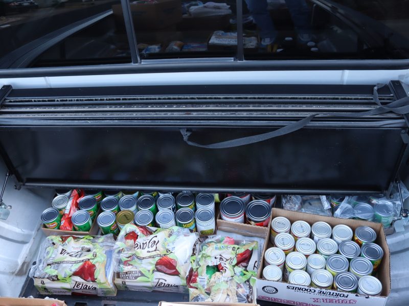 Multiple canned items and food stocks. Diverse foods to be delivered to Miwok tribal elder Mildred Burley in March 2024 Food For Tribal Families delivery.