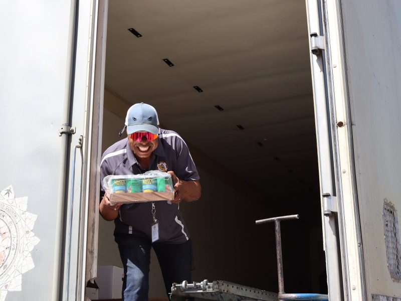 Funning it up a little bit, last of distributions for the day leaving everyone in a jovial mood. Ronald Buckman smiling while delivering goods for the California Valley Miwok Tribe.