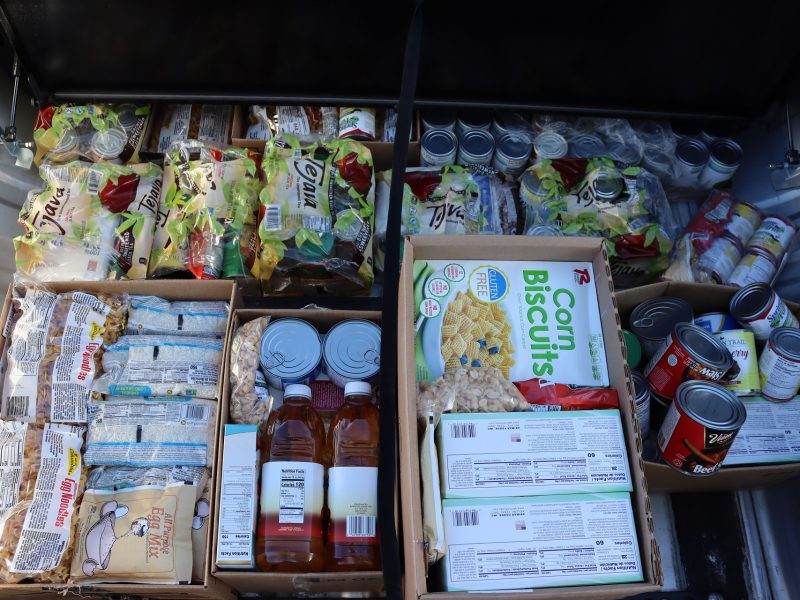 Various canned goods, grains, juices, cereals, crackers, etc.