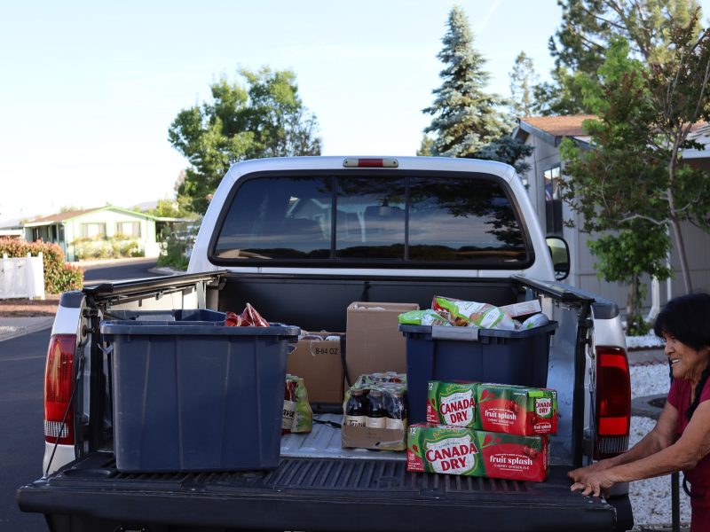 Mildred Burley, our Program director, with refreshments bought exclusively for her own use or to share with recipients, friends and family. She is truly cherished.