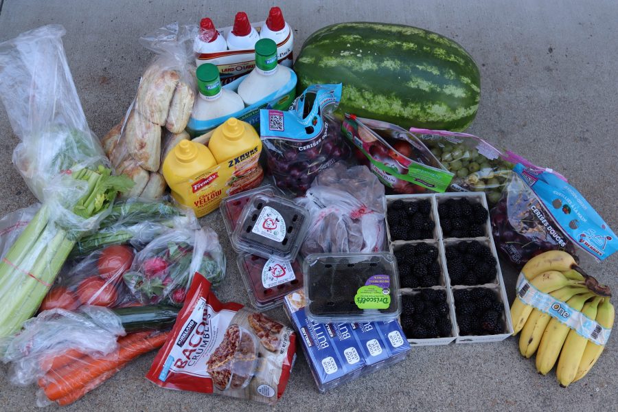 Fruits, vegetables, condiments and bread. Assorted fruits, vegetables, condiments, and bread on a table for the July 2024 Food for Tribal Families Program distribution.