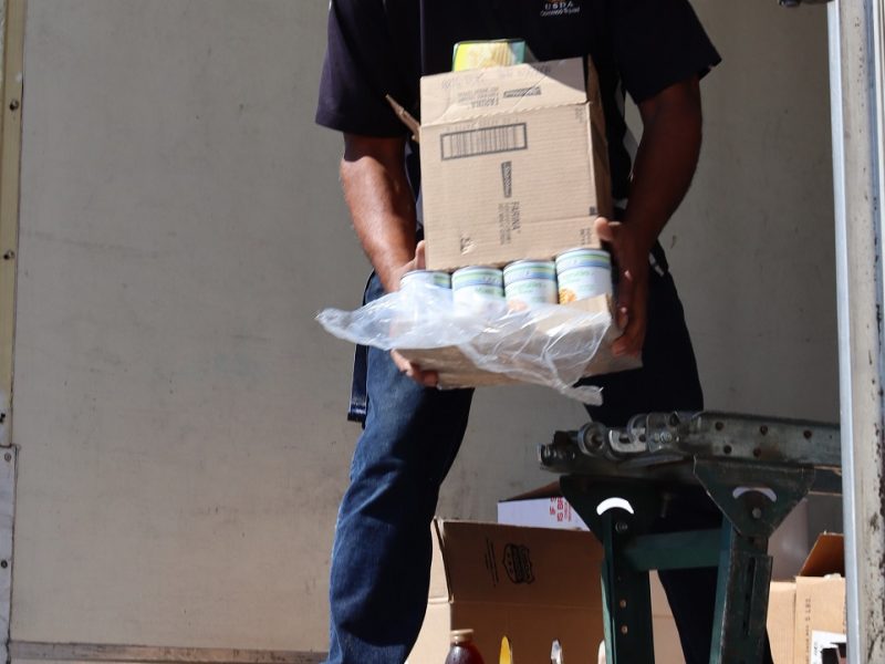 Assistant Director and program provider Ronald Buckman during one of the many moments of the distribution. Ronald Buckman unloads some goods for the California Valley Miwok Tribe.