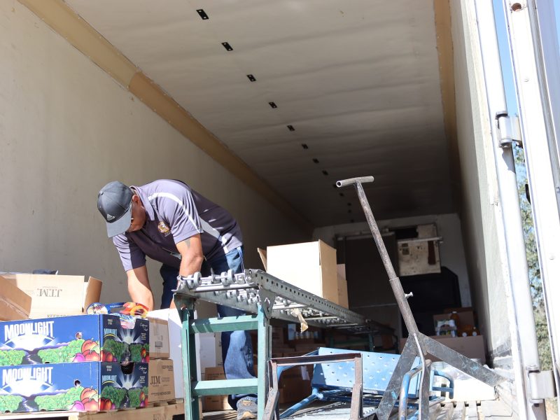 Assistant Director Ronald Buckman preparing the first of what will be many distributions on this day.