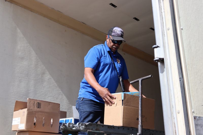 Ronald Buckman with the last couple of boxes of one distribution. Ronald Buckman unloading goods during a food distribution for the California Valley Miwok Tribe in September 2024.