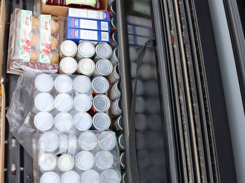 Multiple canned goods and other items.