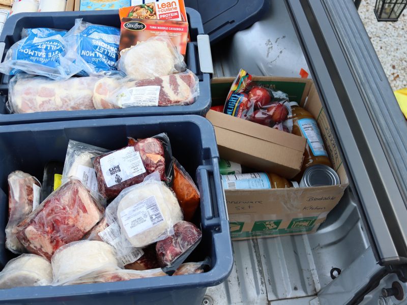 Along with cheese, juice and peaches is over 150 pounds of meats in two large tubs.